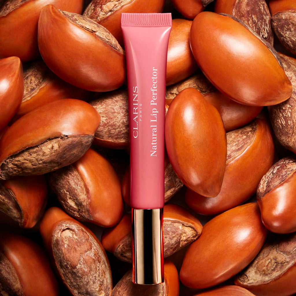 Clarins Instant Light Natural Lip Perfector - Boost Lips & Radiance Shop now at CapitalStore, Oman's leading luxury beauty retailer.